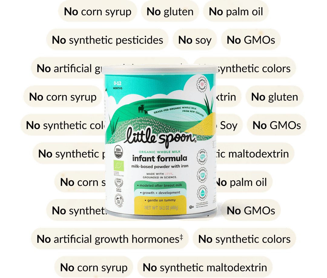 Little Spoon organic whole milk infant formula can on a green background with callouts noting no corn syrup, no palm oil, no soy, no GMOs, and no synthetic ingredients.